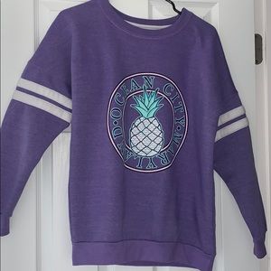 purple crewneck sweatshirt from ocean city md